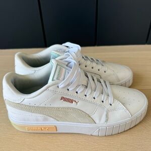Woman’s Puma sneakers, size 7.5